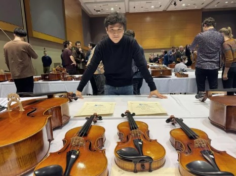 Chen Yufan with his winning instruments and award certificates at the 2024 VSA competition